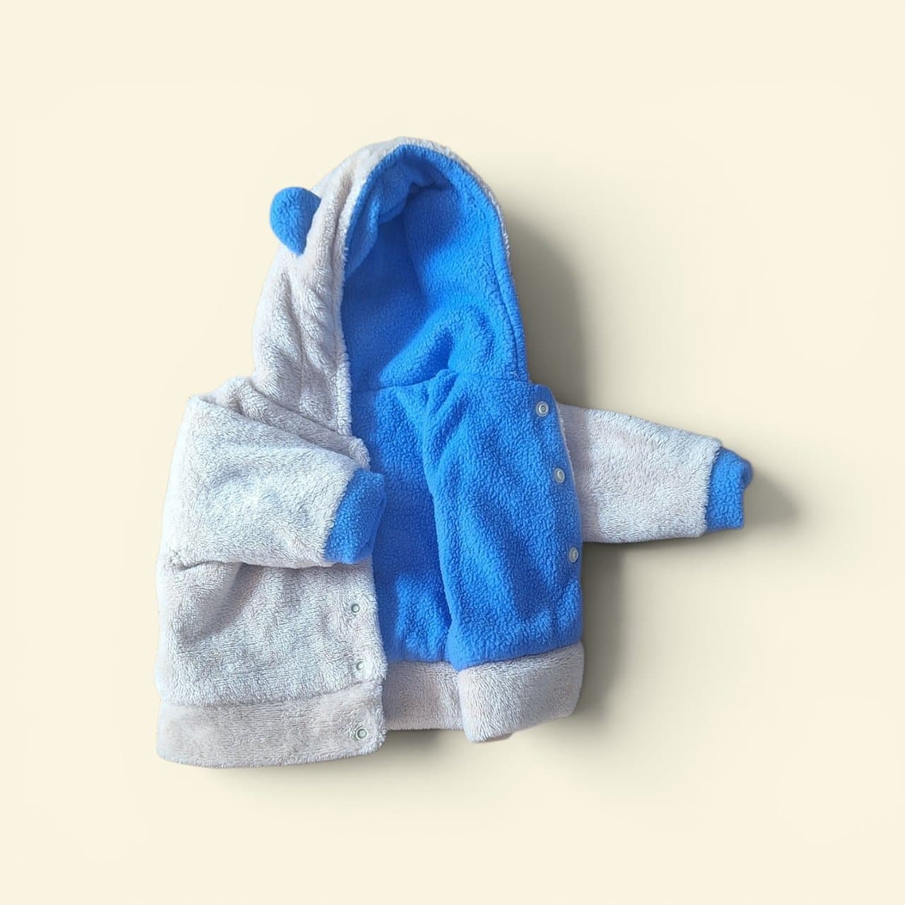 Chaqueta Reversible Café y Azul Recién Nacido